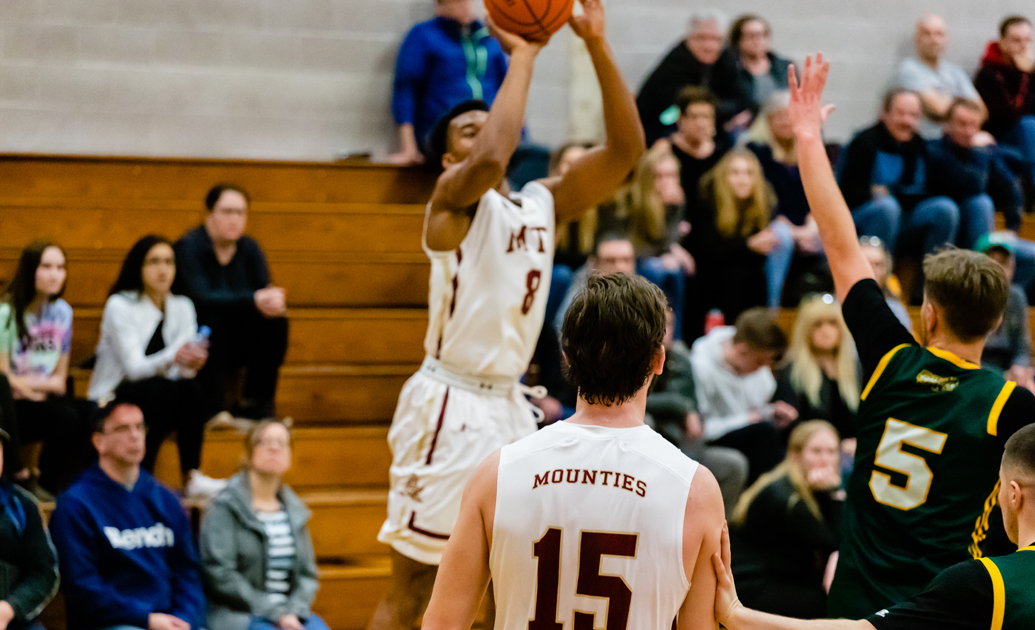 Mounties Edge Tommies - In a First Place Battle”